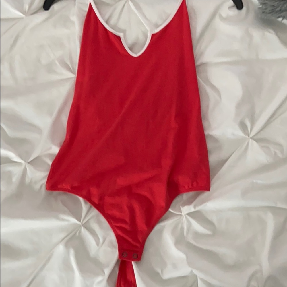 Express Red body suit with white piping